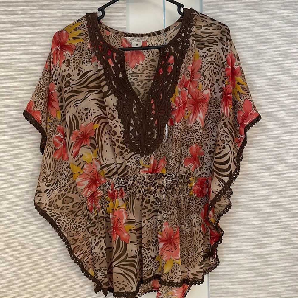 Cheetah top. Perfect for vacation top going out at night or cover up